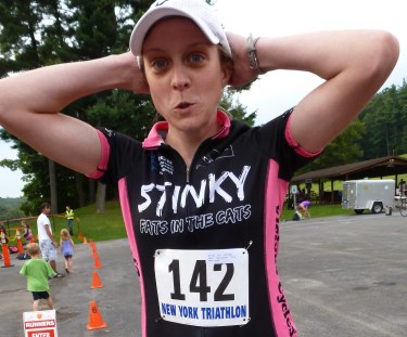 I should get first place for most awkward photo...My concept of stretching before a race (sporting a new Mtn bike jersey)