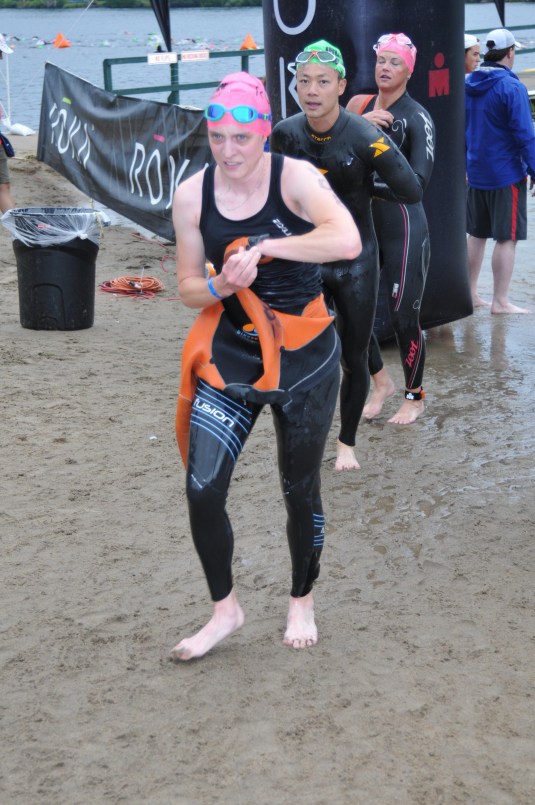 Trying to get my wetsuit over my watch. Face of determination?
